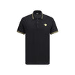 Black Cotton Polo ShirtCotton Polo Shirt by Versace, classic ribbed collar, tone-on-tone front buttons, iconic brand logo patch applied on front, regular fit. Season: AW25 Composition: 100% Cotton MADE IN TUNISIABlack Cotton Polo Shirt${tagsVersaceAulae B