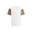White Cotton T-ShirtBurberry’s Cotton Check Archive Sleeve T-shirt is a garment that combines comfort with distinctive style. Featuring a ribbed collar, this T-shirt features sleeves embellished with the iconic Archivio Check pattern, one of the brand’s h