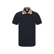 Blue Cotton Polo ShirtCotton Polo Shirt by Burberry, classic ribbed collar with iconic all-over repeated Archivio Check pattern detail, tone-on-tone front buttons, monochrome pattern, regular fit. Season: AW25 Composition: GENERAL 100% Cotton MADE IN PORT