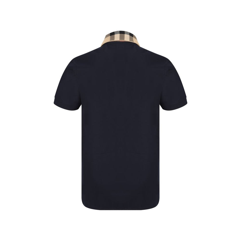 Blue Cotton Polo ShirtCotton Polo Shirt by Burberry, classic ribbed collar with iconic all-over repeated Archivio Check pattern detail, tone-on-tone front buttons, monochrome pattern, regular fit. Season: AW25 Composition: GENERAL 100% Cotton MADE IN PORT
