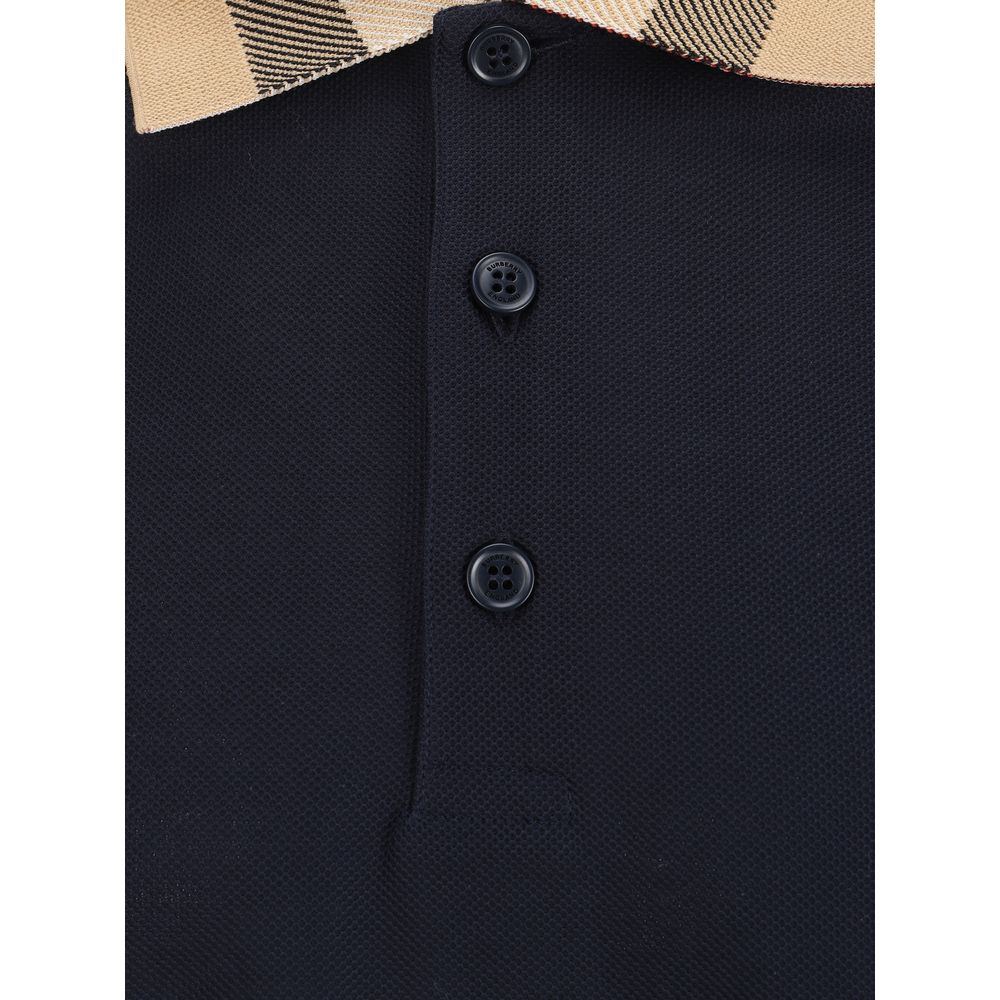 Blue Cotton Polo ShirtCotton Polo Shirt by Burberry, classic ribbed collar with iconic all-over repeated Archivio Check pattern detail, tone-on-tone front buttons, monochrome pattern, regular fit. Season: AW25 Composition: GENERAL 100% Cotton MADE IN PORT