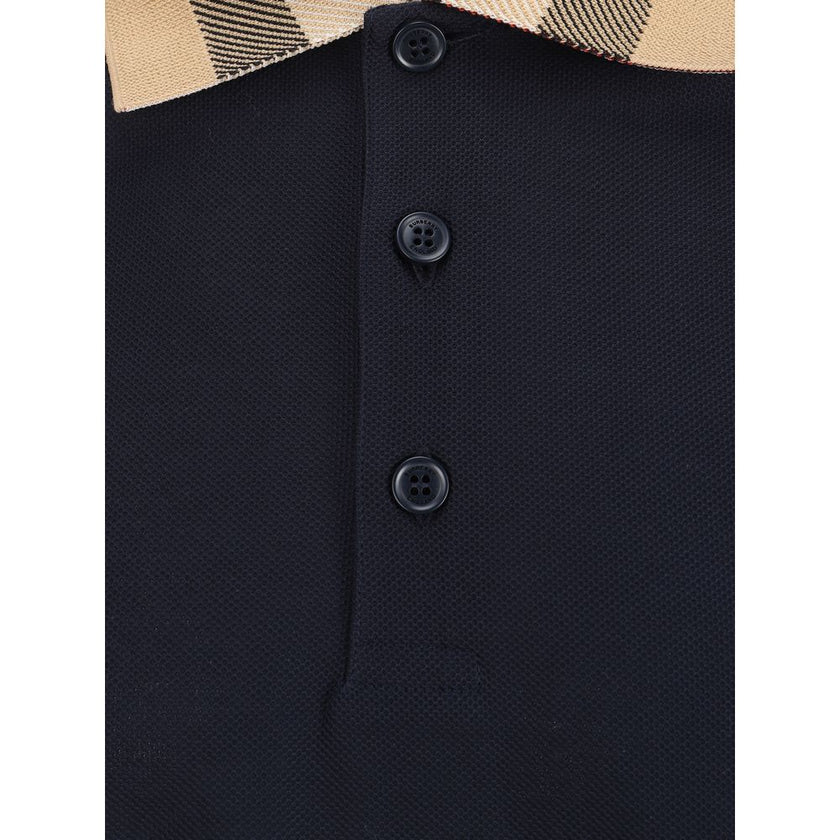 Blue Cotton Polo ShirtCotton Polo Shirt by Burberry, classic ribbed collar with iconic all-over repeated Archivio Check pattern detail, tone-on-tone front buttons, monochrome pattern, regular fit. Season: AW25 Composition: GENERAL 100% Cotton MADE IN PORT