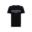 Black Cotton T-ShirtBalmain’s cotton T-Shirt combines the minimalism of a monochrome pattern with the elegance of the Maison’s iconic details. Made of soft cotton, it features a ribbed crew neck and a regular fit designed for everyday comfort. The design