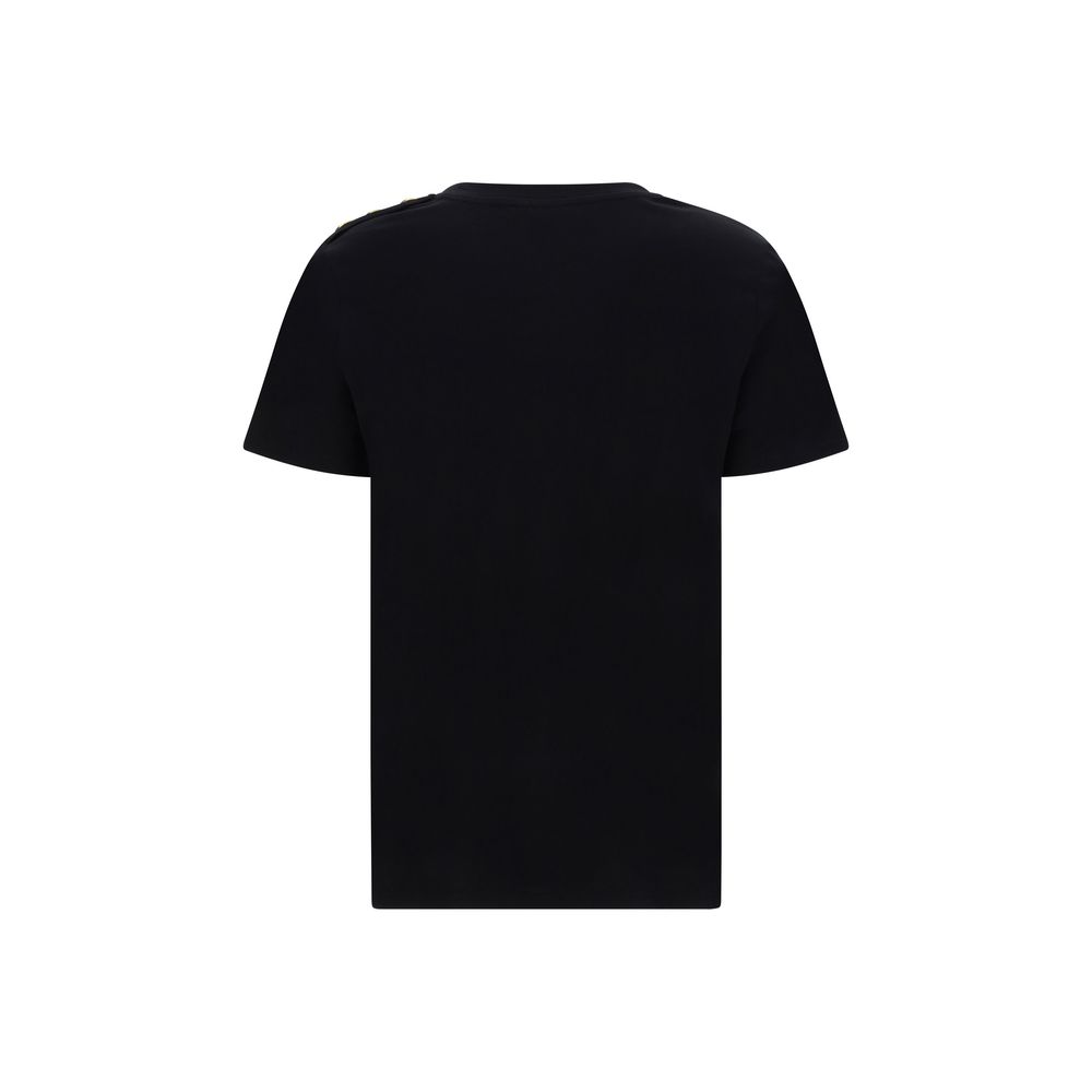 Black Cotton T-ShirtBalmain’s cotton T-Shirt combines the minimalism of a monochrome pattern with the elegance of the Maison’s iconic details. Made of soft cotton, it features a ribbed crew neck and a regular fit designed for everyday comfort. The design
