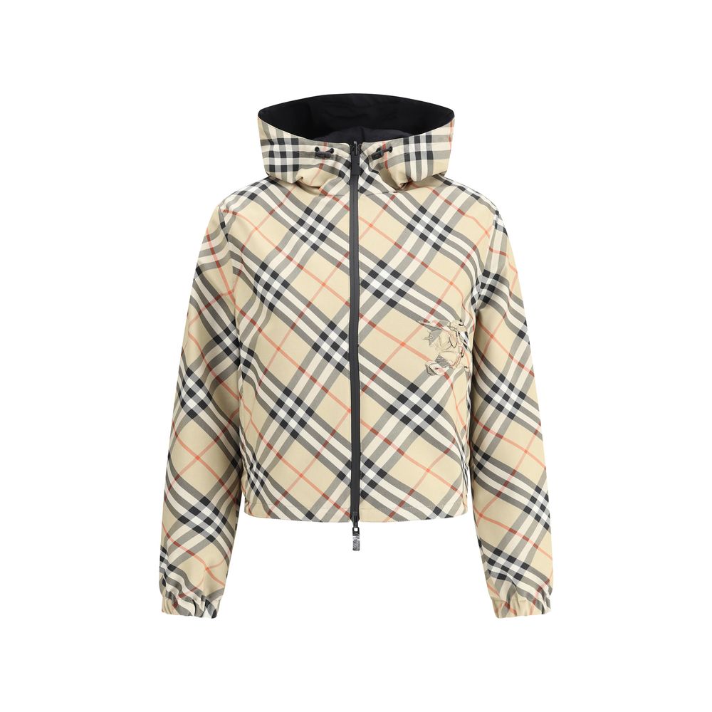 Brown Polyester Shell JacketBurberry’s reversible Jacket is a short, versatile style with an adjustable drawstring hood. The double-slider front zipper allows for convenient closure, while zippered side welt pockets offer functionality. Elasticized cuffs
