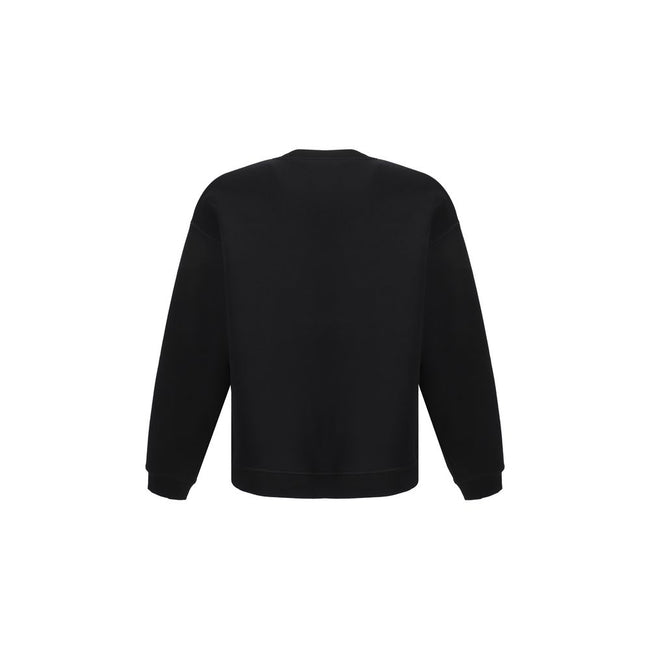 Black Cotton SweatshirtDsquared2’s cotton Sweatshirt is a casual garment with a bold and comfortable style. Made of soft cotton with a plush interior, it offers a warm and comfortable feel ideal for the cooler season. The monochrome design is enhanced by