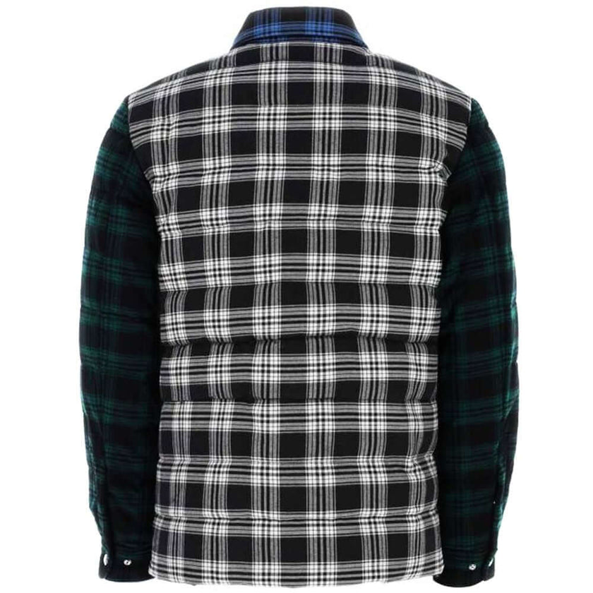 Multicolor Cotton Men JacketElevate your wardrobe with the Woolrich statement piece that effortlessly blends style and practicality, perfect for the modern trendsetter. This multicolored checked shirt jacket is crafted from luxe cotton and features a cozy