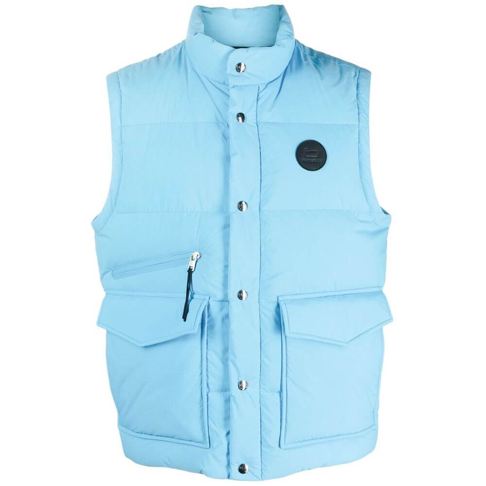 Blue Polyester Men VestElevate your outerwear collection with Woolrich’s expertly crafted down vest. Designed for the discerning gentleman, this technical blue polyester vest is sumptuously filled with lush goose down for unparalleled warmth. The silhouet