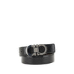 Black Calf Leather Bos Taurus Regular BeltFerragamo’s Reversible Leather Belt features a refined monochrome design on both sides, ideal for adapting to different looks with just one accessory. The metal buckle is decorated with the iconic Gancini logo, a