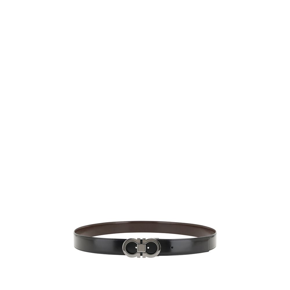 Black Calf Leather Bos Taurus Regular BeltFerragamo’s Reversible Leather Belt features a refined monochrome design on both sides, ideal for adapting to different looks with just one accessory. The metal buckle is decorated with the iconic Gancini logo, a