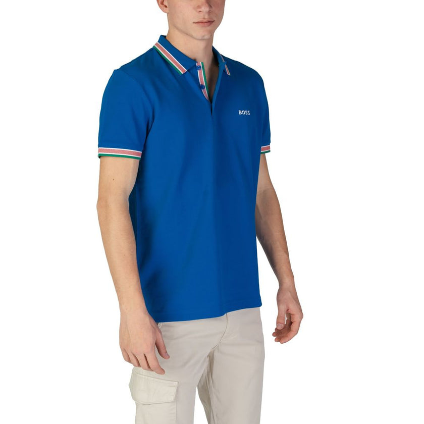 Blue Cotton Polo ShirtThis short-sleeved men’s polo shirt by Boss, model 10241663 50469055, is crafted from 100% high-quality cotton, ensuring comfort and breathability throughout the day. The modern design features contrasting details on the collar and s