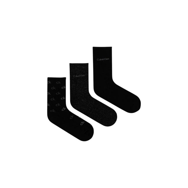 Black Cotton SocksDiscover the elegance and comfort of the Calvin Klein SOCK 3P LUREX LOGO GI 701229444 women’s socks. Made with high-quality materials, these socks are composed of 49% cotton, 42% polyamide, 7% metallic fibers, and 2% elastane/lycra, ensu