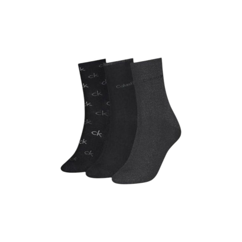Black Cotton SocksDiscover the elegance and comfort of the Calvin Klein SOCK 3P LUREX LOGO GI 701229444 women’s socks. Made with high-quality materials, these socks are composed of 49% cotton, 42% polyamide, 7% metallic fibers, and 2% elastane/lycra, ensu
