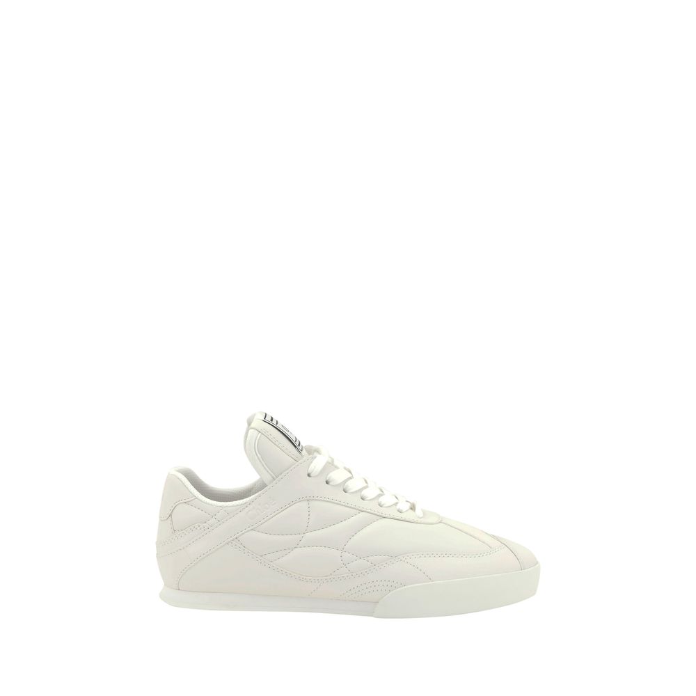 White Calf Leather Bos Taurus Low Top SneakersChloé’s Leather Kick Sneakers combine elegance and practicality in a modern, versatile design. With a flat sole, these sneakers offer all-day comfort and support. The front lace-up closure allows for an adjust