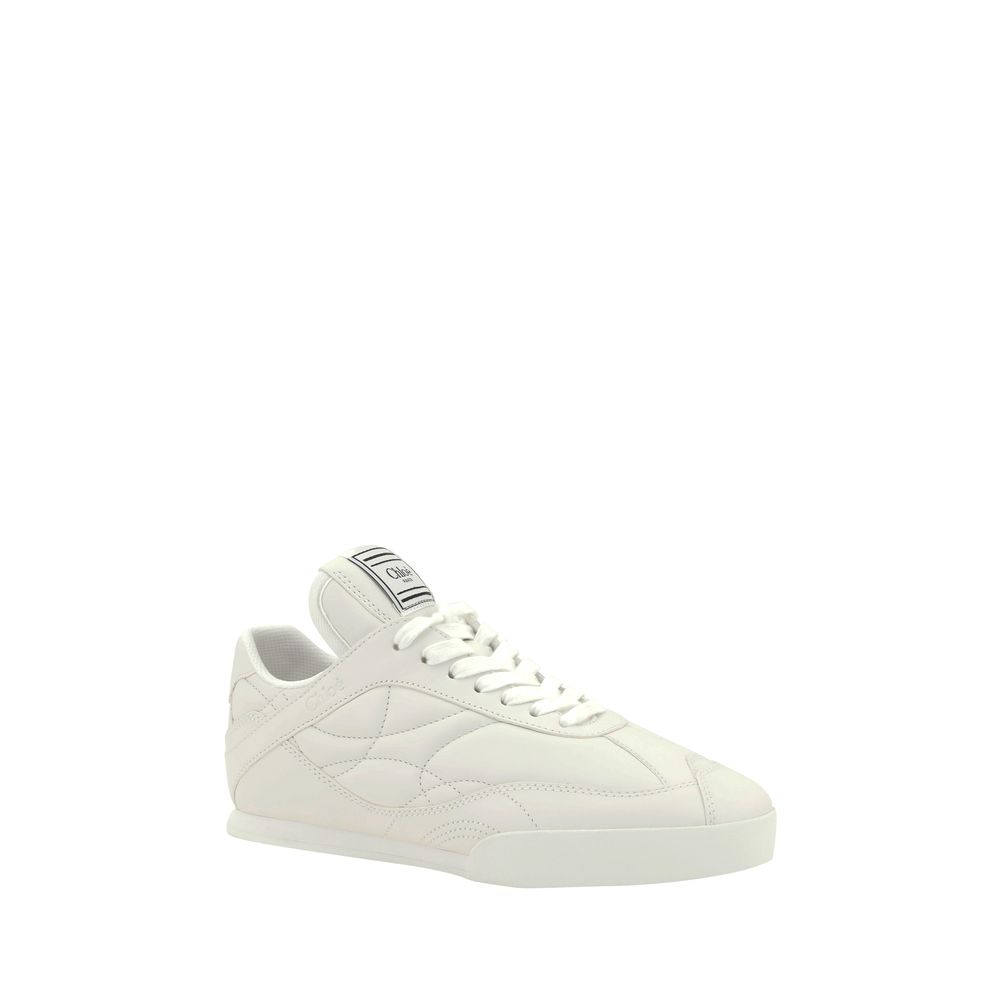 White Calf Leather Bos Taurus Low Top SneakersChloé’s Leather Kick Sneakers combine elegance and practicality in a modern, versatile design. With a flat sole, these sneakers offer all-day comfort and support. The front lace-up closure allows for an adjust