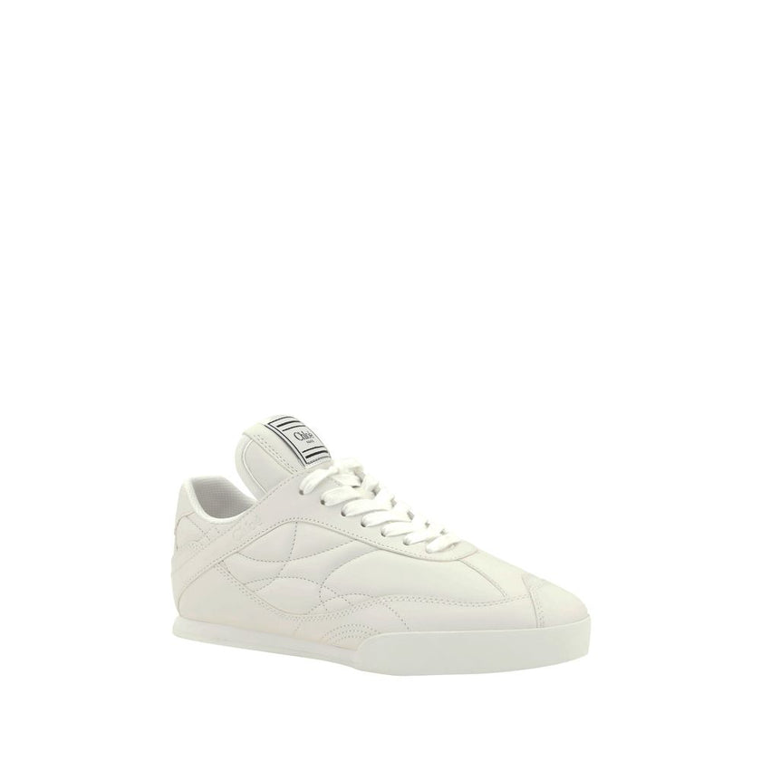 White Calf Leather Bos Taurus Low Top SneakersChloé’s Leather Kick Sneakers combine elegance and practicality in a modern, versatile design. With a flat sole, these sneakers offer all-day comfort and support. The front lace-up closure allows for an adjust