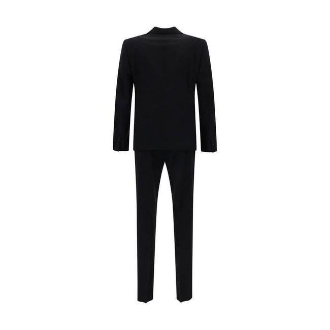 Blue Fleece Wool Two-Piece SuitThe Dsquared2 virgin wool Suit, consisting of a jacket and trousers, is a timeless classic revisited with the brand’s distinctive style. The blazer jacket, made of pure wool, features a front closure with matching buttons, c