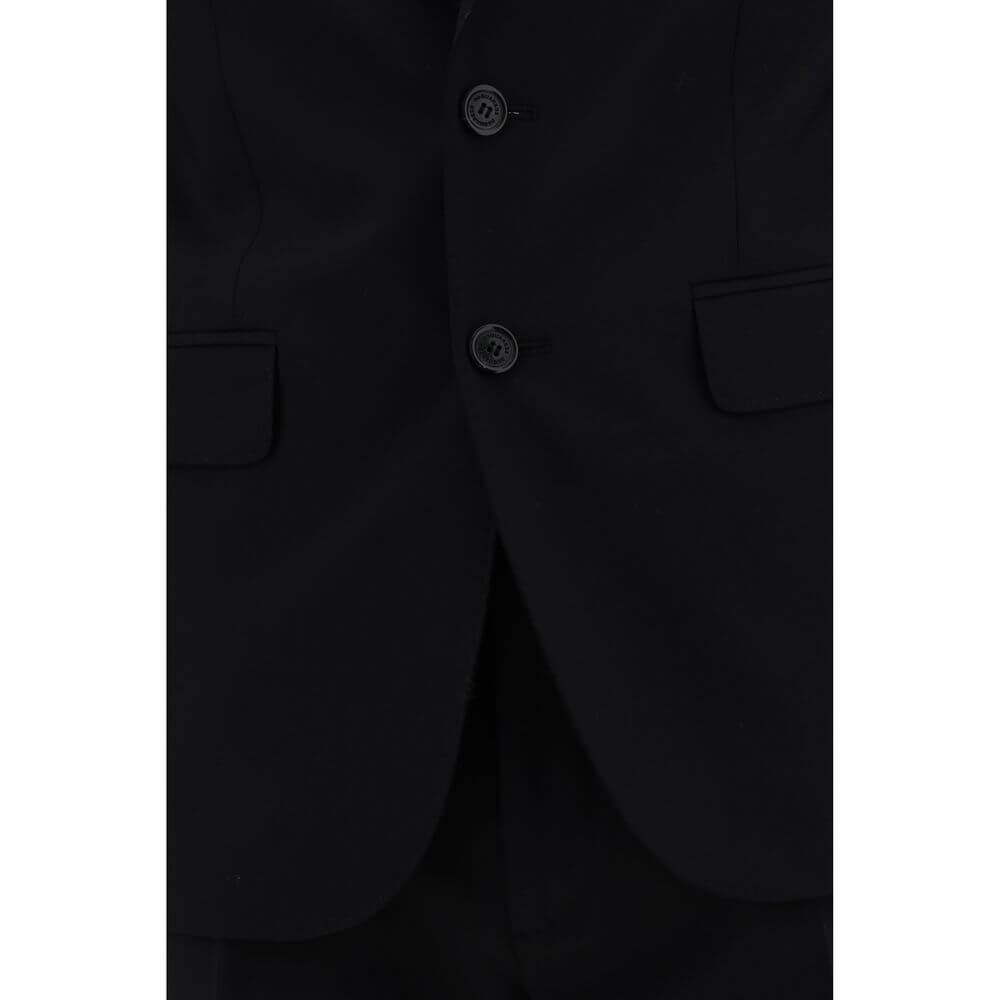 Blue Fleece Wool Two-Piece SuitThe Dsquared2 virgin wool Suit, consisting of a jacket and trousers, is a timeless classic revisited with the brand’s distinctive style. The blazer jacket, made of pure wool, features a front closure with matching buttons, c