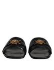 Black Leather Logo Plaque Slip On Slides Flats ShoesVERSACE Gorgeous brand new with tags, 100% Authentic VERSACE black leather logo plaque open toe slip-on style. Model: Slides slip on sandals Color: Black with gold metal detailing Material: 100% Leather