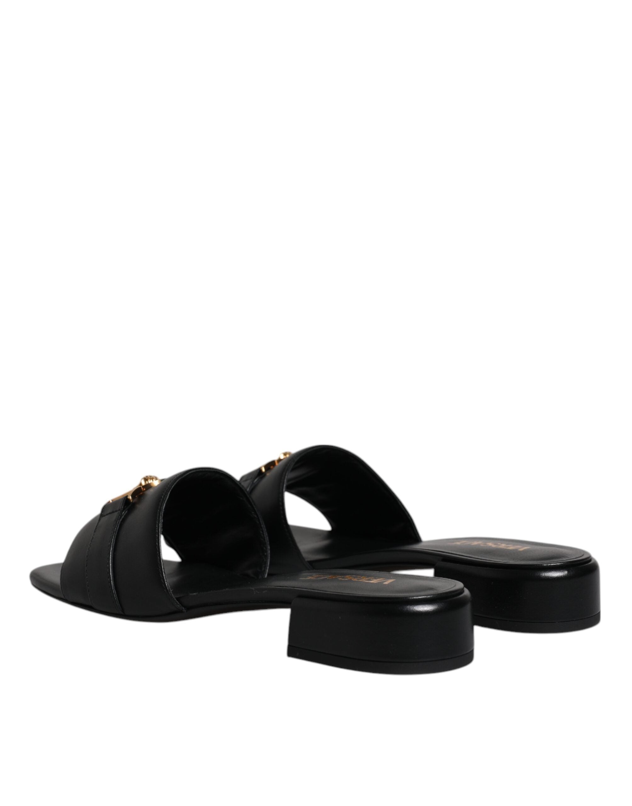 Black Leather Logo Plaque Slip On Slides Flats ShoesVERSACE Gorgeous brand new with tags, 100% Authentic VERSACE black leather logo plaque open toe slip-on style. Model: Slides slip on sandals Color: Black with gold metal detailing Material: 100% Leather