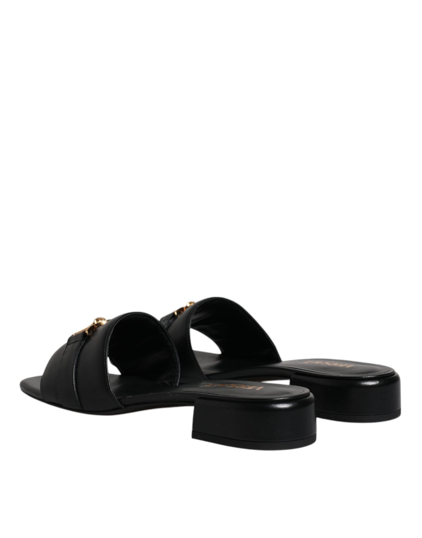 Black Leather Logo Plaque Slip On Slides Flats ShoesVERSACE Gorgeous brand new with tags, 100% Authentic VERSACE black leather logo plaque open toe slip-on style. Model: Slides slip on sandals Color: Black with gold metal detailing Material: 100% Leather