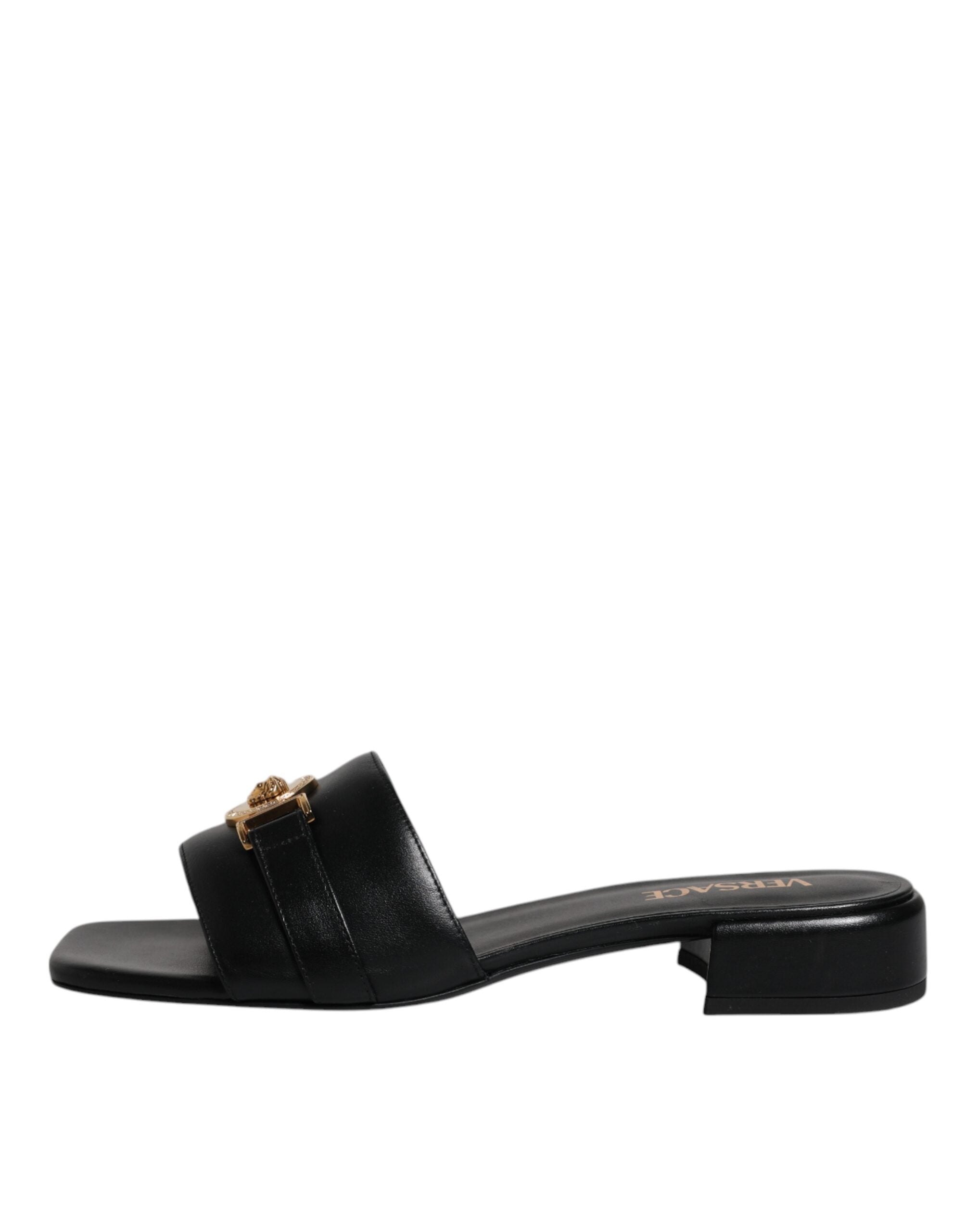 Black Leather Logo Plaque Slip On Slides Flats ShoesVERSACE Gorgeous brand new with tags, 100% Authentic VERSACE black leather logo plaque open toe slip-on style. Model: Slides slip on sandals Color: Black with gold metal detailing Material: 100% Leather