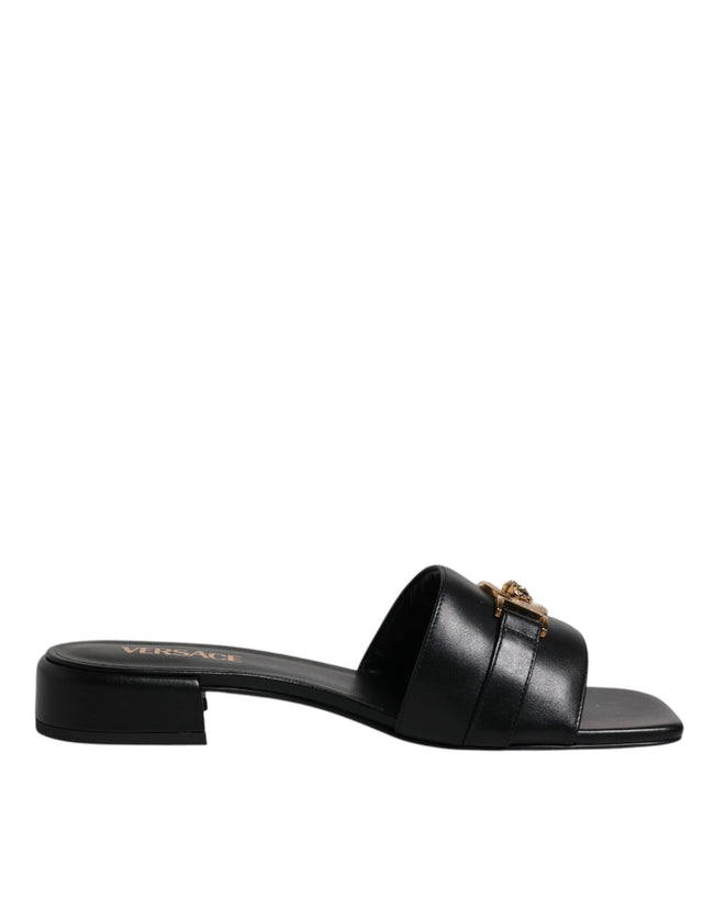 Black Leather Logo Plaque Slip On Slides Flats ShoesVERSACE Gorgeous brand new with tags, 100% Authentic VERSACE black leather logo plaque open toe slip-on style. Model: Slides slip on sandals Color: Black with gold metal detailing Material: 100% Leather