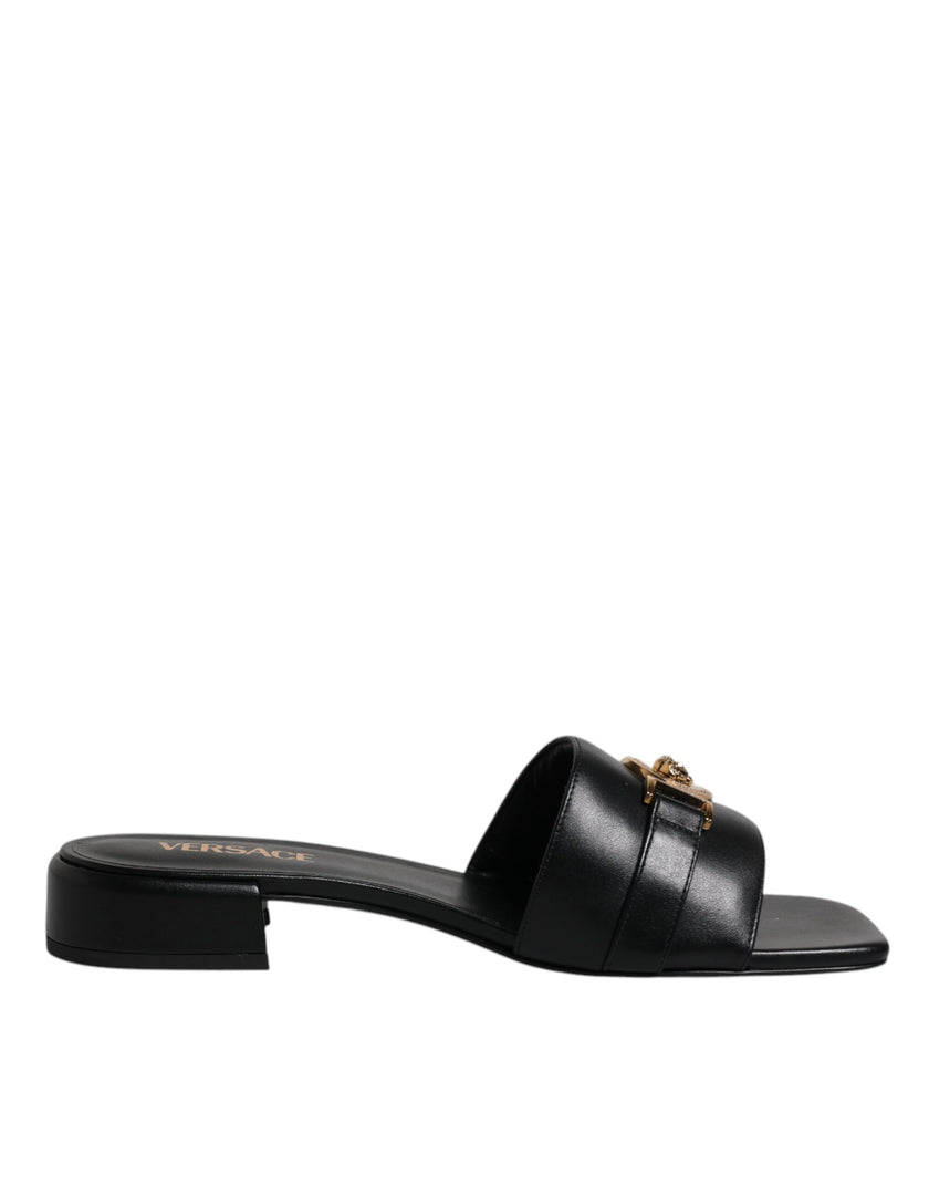 Black Leather Logo Plaque Slip On Slides Flats ShoesVERSACE Gorgeous brand new with tags, 100% Authentic VERSACE black leather logo plaque open toe slip-on style. Model: Slides slip on sandals Color: Black with gold metal detailing Material: 100% Leather