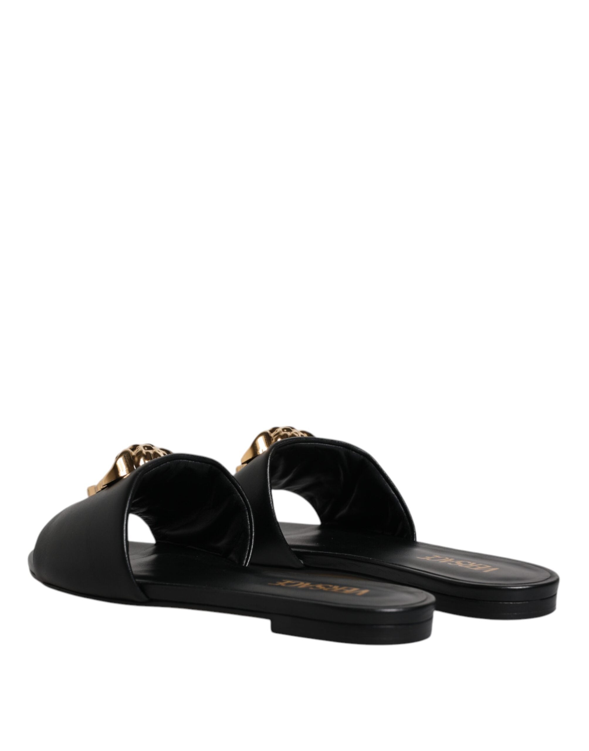 Black Leather Logo Plaque Slip On Slides Flats ShoesVERSACE Gorgeous brand new with tags, 100% Authentic VERSACE black leather logo plaque open toe slip-on style. Model: Slides slip on sandals Color: Black with gold metal detailing Material: 100% Leather