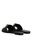 Black Leather Logo Plaque Slip On Slides Flats ShoesVERSACE Gorgeous brand new with tags, 100% Authentic VERSACE black leather logo plaque open toe slip-on style. Model: Slides slip on sandals Color: Black with gold metal detailing Material: 100% Leather