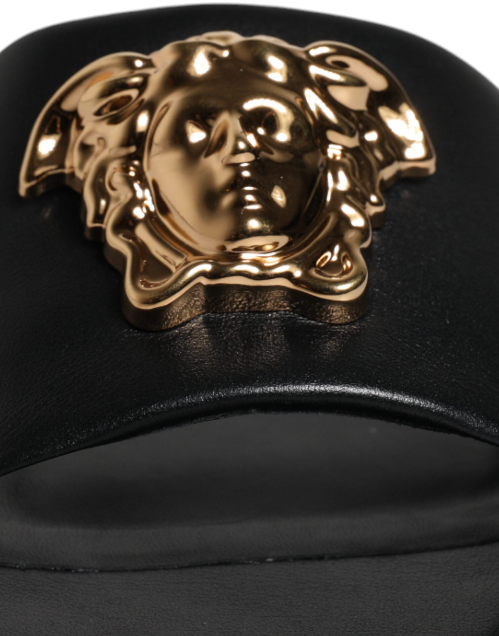 Black Leather Logo Plaque Slip On Slides Flats ShoesVERSACE Gorgeous brand new with tags, 100% Authentic VERSACE black leather logo plaque open toe slip-on style. Model: Slides slip on sandals Color: Black with gold metal detailing Material: 100% Leather