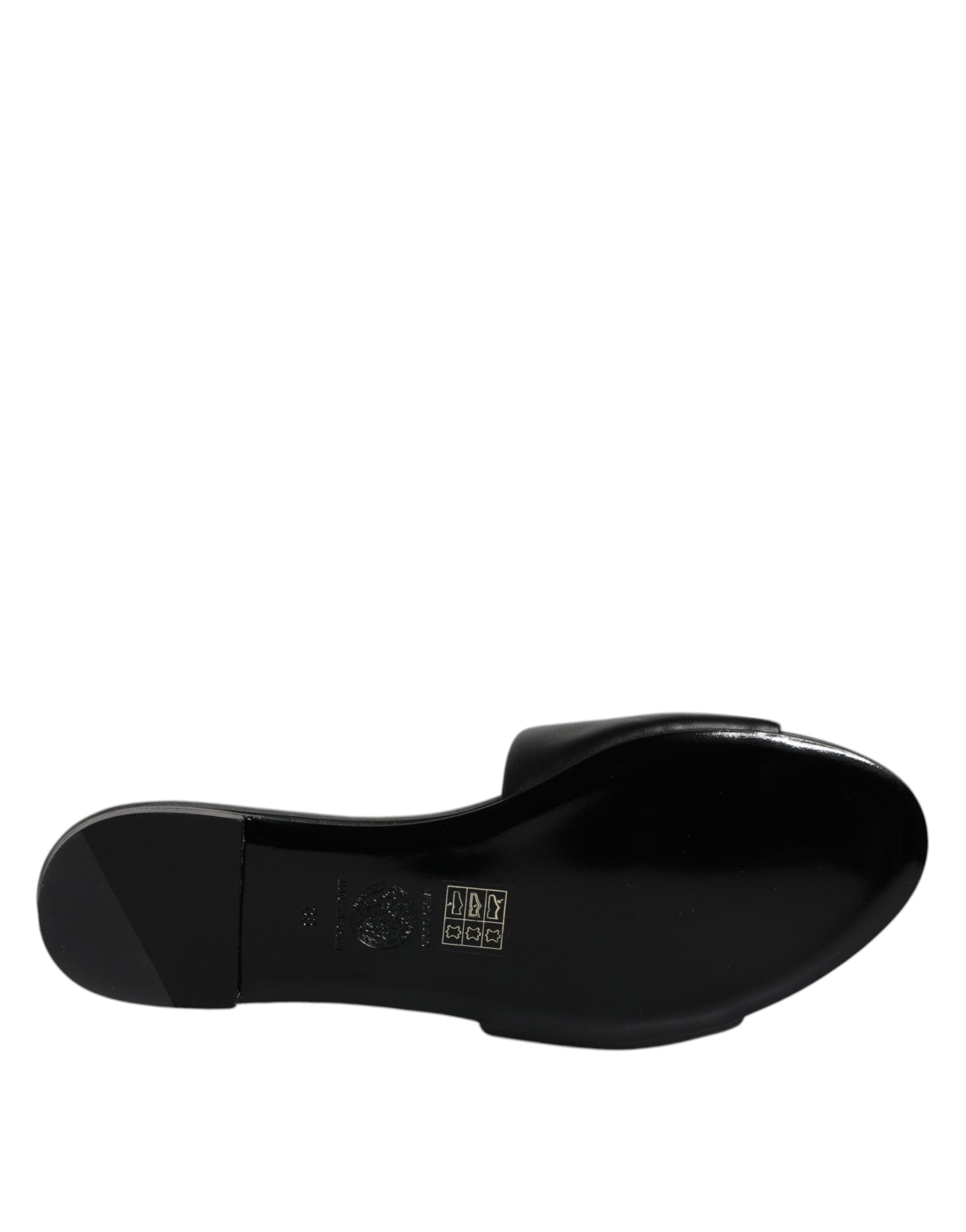 Black Leather Logo Plaque Slip On Slides Flats ShoesVERSACE Gorgeous brand new with tags, 100% Authentic VERSACE black leather logo plaque open toe slip-on style. Model: Slides slip on sandals Color: Black with gold metal detailing Material: 100% Leather