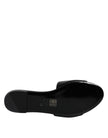 Black Leather Logo Plaque Slip On Slides Flats ShoesVERSACE Gorgeous brand new with tags, 100% Authentic VERSACE black leather logo plaque open toe slip-on style. Model: Slides slip on sandals Color: Black with gold metal detailing Material: 100% Leather
