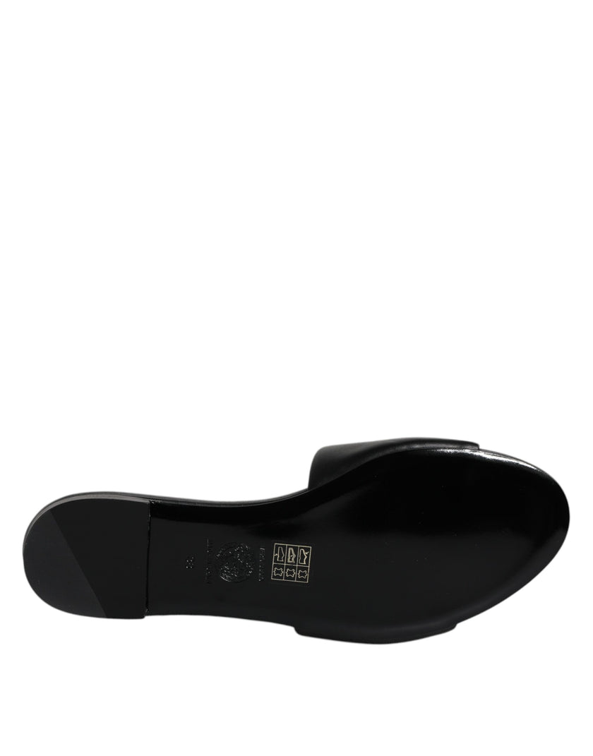 Black Leather Logo Plaque Slip On Slides Flats ShoesVERSACE Gorgeous brand new with tags, 100% Authentic VERSACE black leather logo plaque open toe slip-on style. Model: Slides slip on sandals Color: Black with gold metal detailing Material: 100% Leather