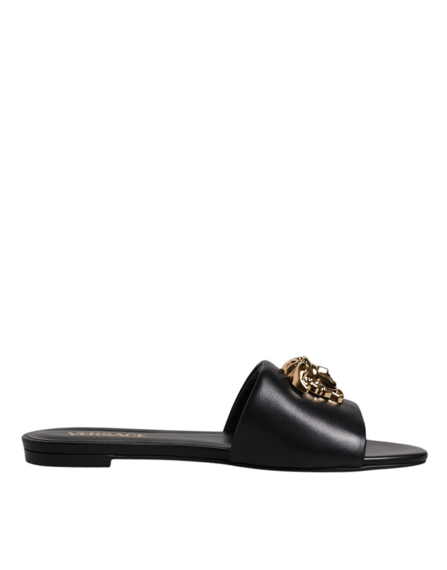 Black Leather Logo Plaque Slip On Slides Flats ShoesVERSACE Gorgeous brand new with tags, 100% Authentic VERSACE black leather logo plaque open toe slip-on style. Model: Slides slip on sandals Color: Black with gold metal detailing Material: 100% Leather