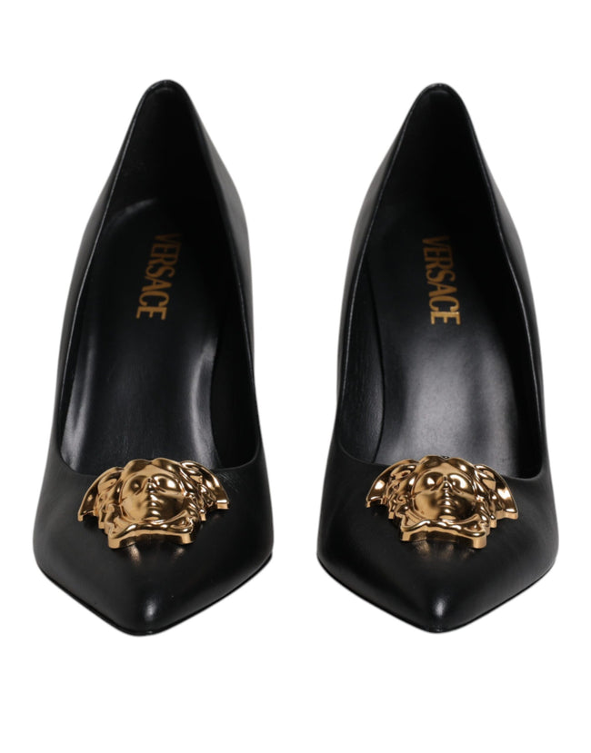 Black Leather Logo Plaque High Heels Pumps ShoesVERSACE Gorgeous brand new with tags, 100% Authentic VERSACE black leather logo plaque high heels pumps. Model: Heels pumps Color: Black with gold metal detailing Material: 100% Calf Leather Leather sole Log