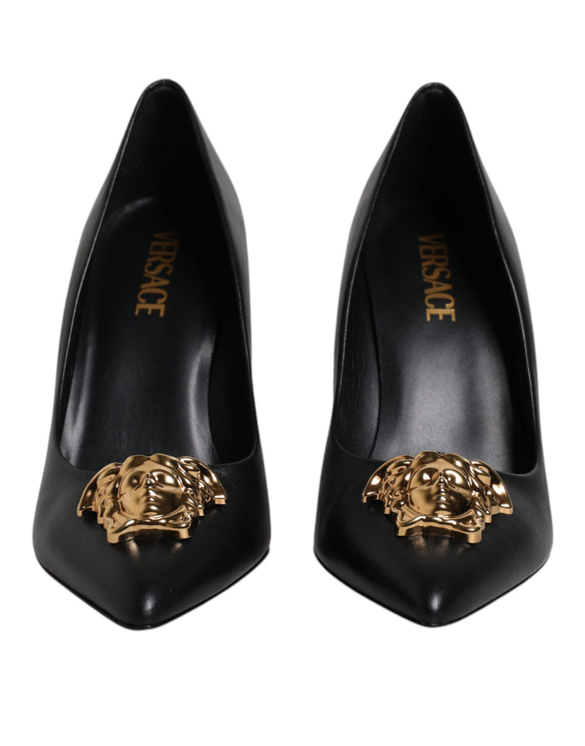 Black Leather Logo Plaque High Heels Pumps ShoesVERSACE Gorgeous brand new with tags, 100% Authentic VERSACE black leather logo plaque high heels pumps. Model: Heels pumps Color: Black with gold metal detailing Material: 100% Calf Leather Leather sole Log