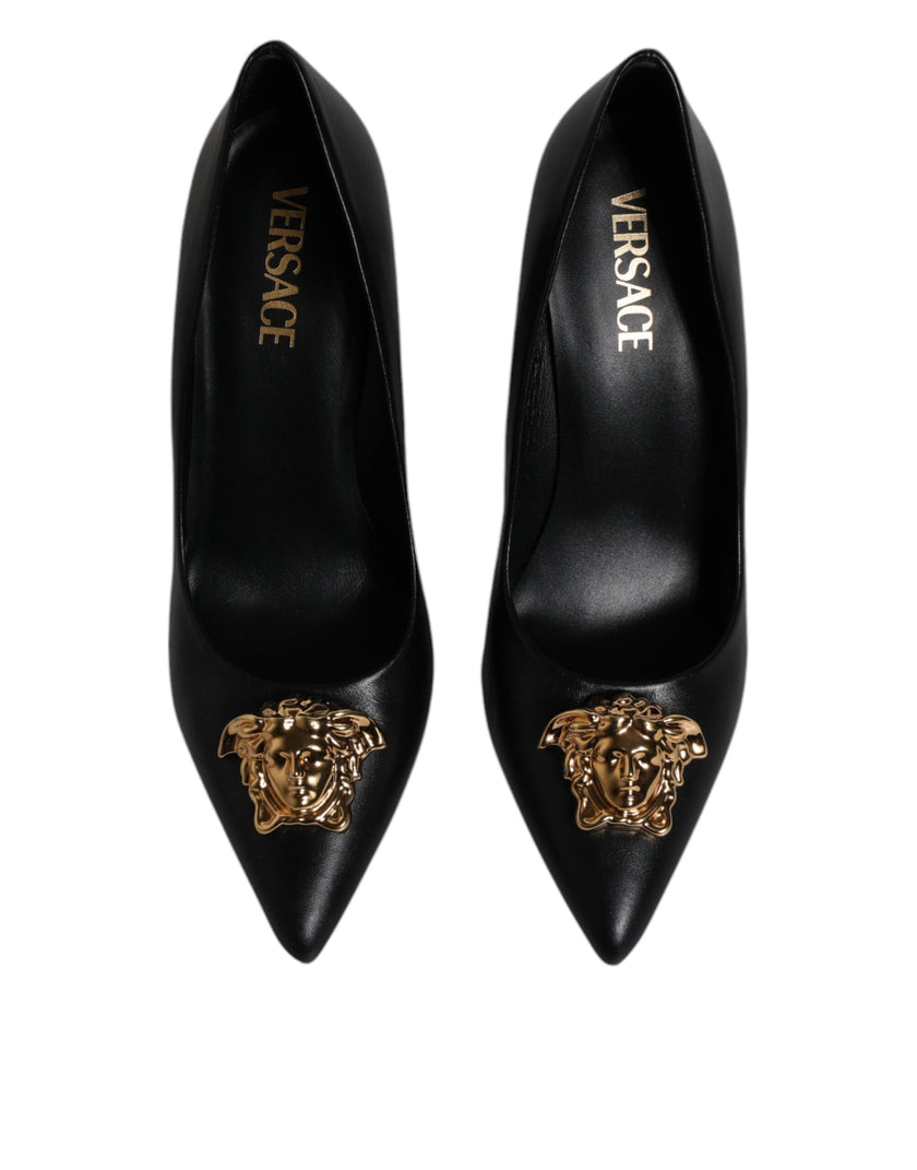 Black Leather Logo Plaque High Heels Pumps ShoesVERSACE Gorgeous brand new with tags, 100% Authentic VERSACE black leather logo plaque high heels pumps. Model: Heels pumps Color: Black with gold metal detailing Material: 100% Calf Leather Leather sole Log