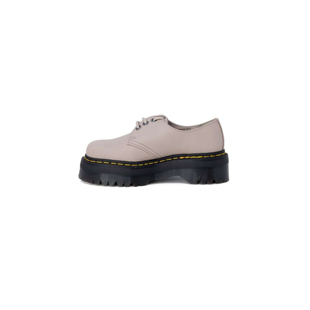 Purple Leather Lace-Up BootsThe Dr. Martens 1461 Quad II Vintage Pisa women’s lace-up shoes embody the iconic British brand’s style with a modern twist. Crafted entirely from 100% high-quality leather, these lace-ups feature a smooth, durable upper with a
