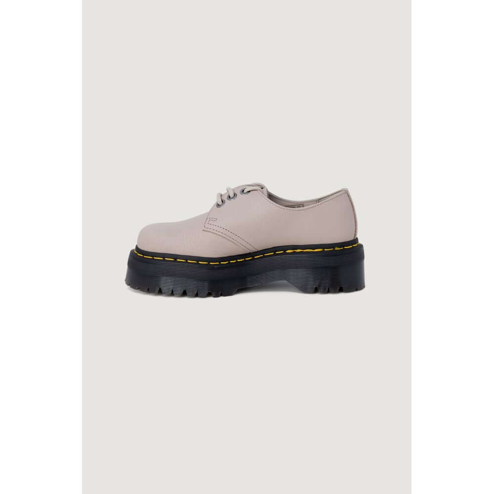 Purple Leather Lace-Up BootsThe Dr. Martens 1461 Quad II Vintage Pisa women’s lace-up shoes embody the iconic British brand’s style with a modern twist. Crafted entirely from 100% high-quality leather, these lace-ups feature a smooth, durable upper with a