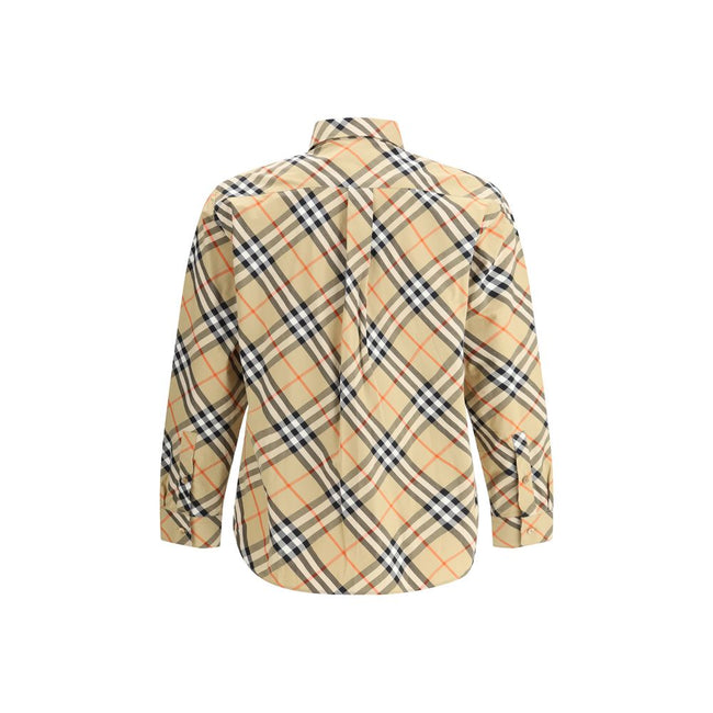 Beige Cotton Pattern ShirtBurberry’s Archive Check Shirt is a timeless classic, made with the iconic Archive Check pattern covering the entire surface. It features a classic collar and front button closure, while adjustable button cuffs add practicality a