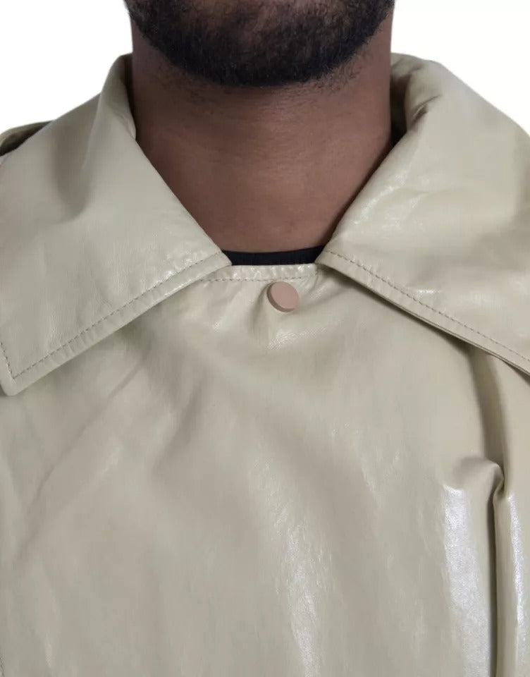 Beige Lambskin Leather Trench Coat JacketBOTTEGA VENETA Absolutely stunning, 100% Authentic, brand new with tags BOTTEGA VENETA trench coat waterproof jacket. Model: Trench coat jacket Colour: Black Material: 100% Calf Leather Full button closure Logo det