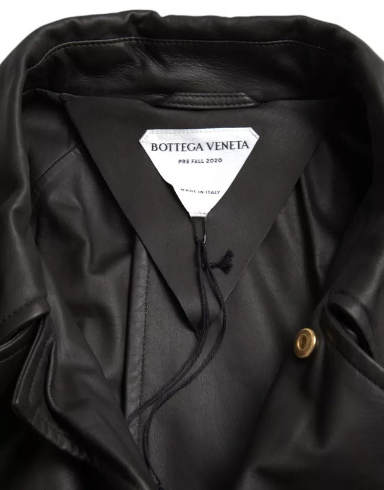 Black Leather Men Waterproof Trenchcoat JacketBOTTEGA VENETA Absolutely stunning, 100% Authentic, brand new with tags BOTTEGA VENETA trench coat jacket. Model: Trench coat jacket Colour: Black Material: 100% Calf Leather Full button closure Logo details M
