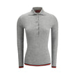 Gray Cashmere TopGucci’s Cashmere Polo Sweater is an elegant and sophisticated piece, crafted from soft cashmere for superior comfort. The long-sleeved style features a classic collar and tone-on-tone buttons on the front, adding an understated touch of s
