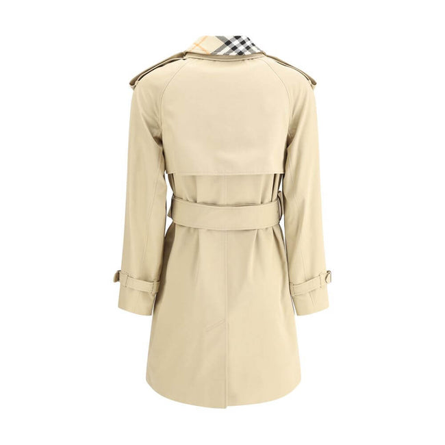 Breasted TrenchCotton Breasted Trench by Burberry is a stylish and versatile garment featuring a double-breasted design with front button closure. The classic double-layered collar features a removable part with the iconic Archivio Check pattern, which ad