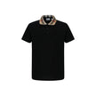 Black Cotton Polo ShirtCotton Cody Polo Shirt by Burberry, a classic collar embellished with the brand’s iconic Archivio Check pattern, a front button closure, a monochrome design, and a regular fit. Season: AW25 Composition: GENERAL 100% Cotton MADE IN P