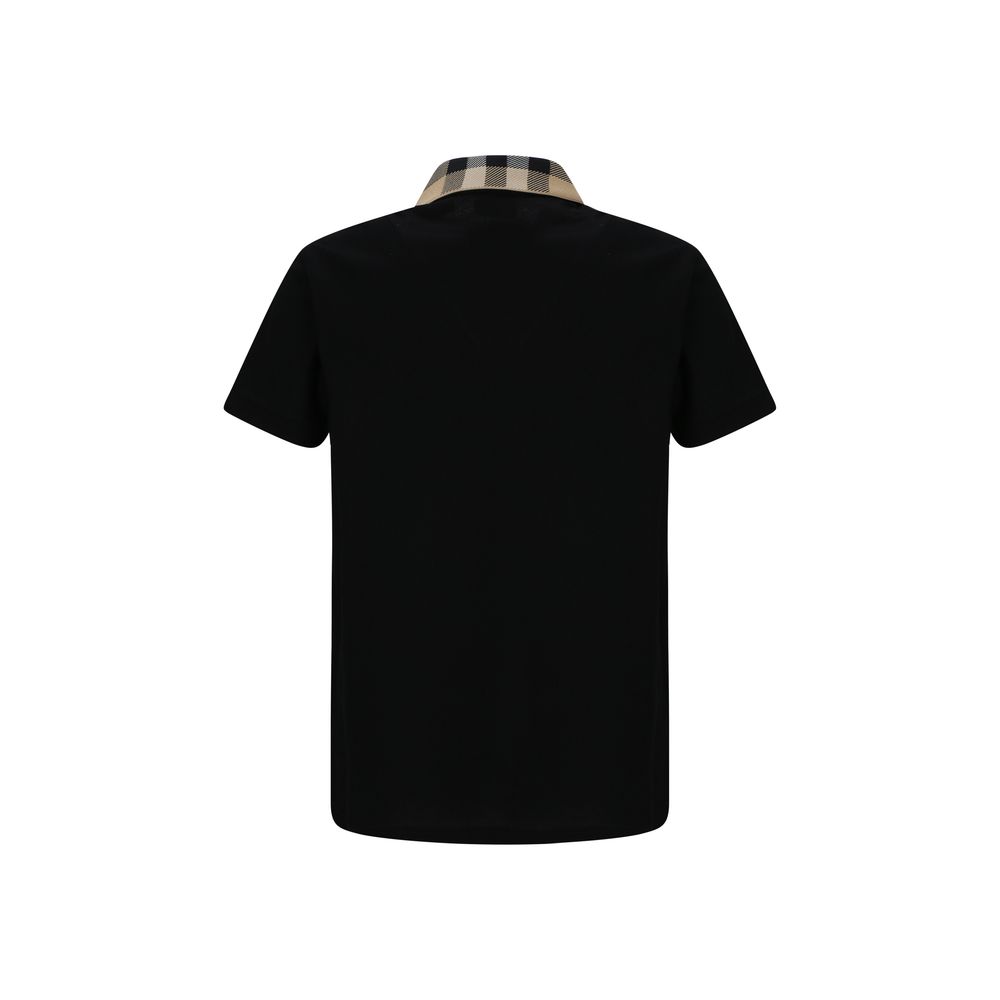 Black Cotton Polo ShirtCotton Cody Polo Shirt by Burberry, a classic collar embellished with the brand’s iconic Archivio Check pattern, a front button closure, a monochrome design, and a regular fit. Season: AW25 Composition: GENERAL 100% Cotton MADE IN P