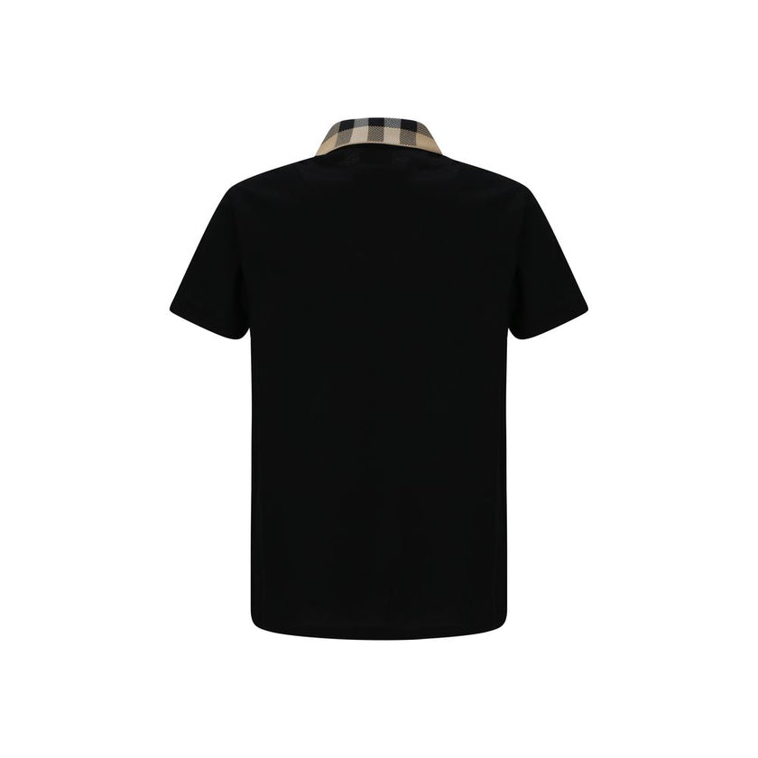 Black Cotton Polo ShirtCotton Cody Polo Shirt by Burberry, a classic collar embellished with the brand’s iconic Archivio Check pattern, a front button closure, a monochrome design, and a regular fit. Season: AW25 Composition: GENERAL 100% Cotton MADE IN P