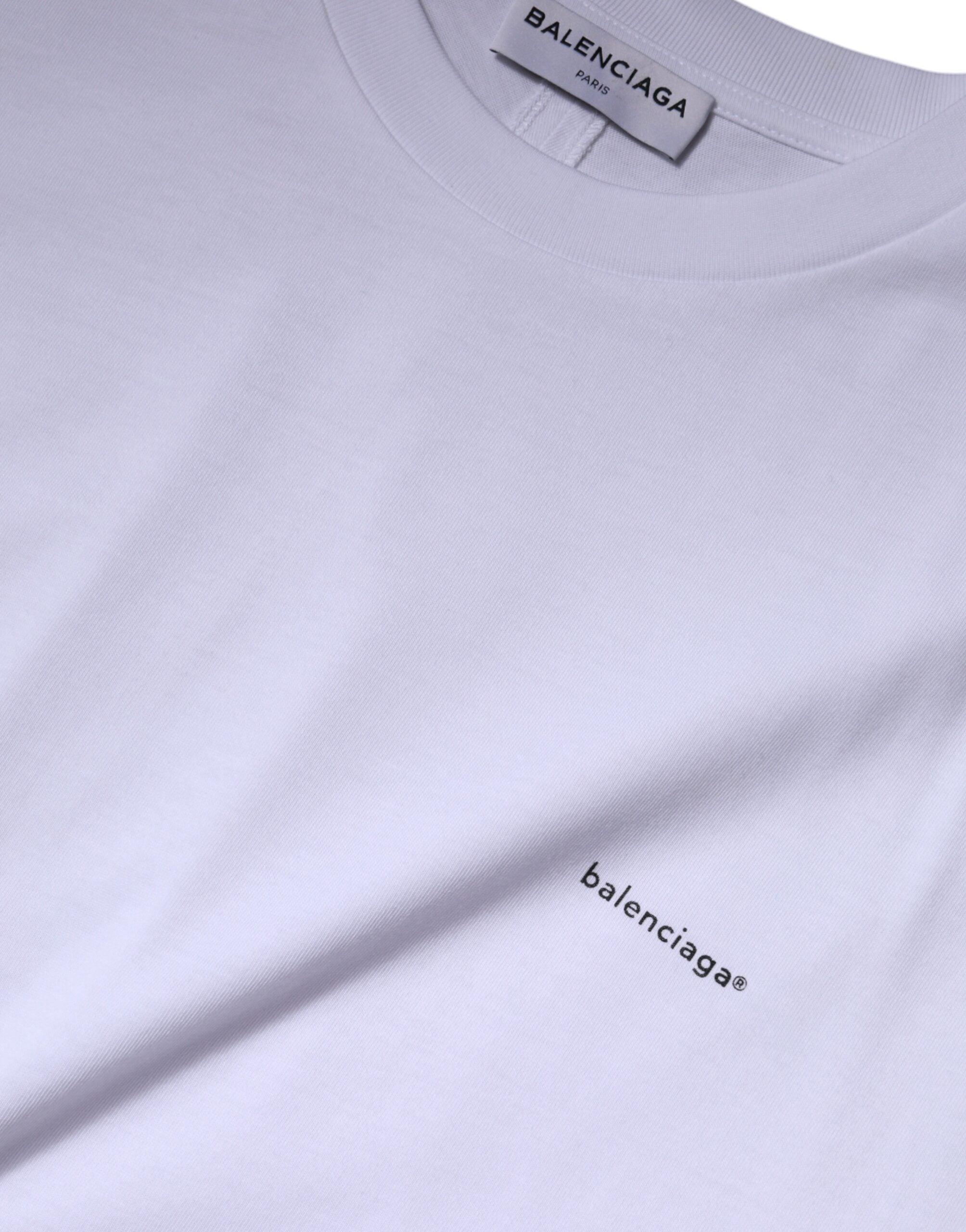 White Logo Cotton Crew Neck Short Sleeves T-shirtBALENCIAGA Absolutely stunning, 100% Authentic brand new Balenciaga cotton crew neck t-shirt with logo print. Model: Short sleeves crew neck t-shirt Colour: White Material: 100% Cotton Logo details Made in