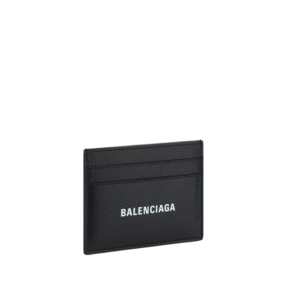 Black Calf Leather Bos Taurus WalletCalfskin Card Holder by Balenciaga, card slots on front and back, iconic brand monogram contrasting on front. Season: AW25 Dimension: 9×9 Composition: 100% Calf Leather Bos Taurus MADE IN ITALYBlack Calf Leather Bos Tau